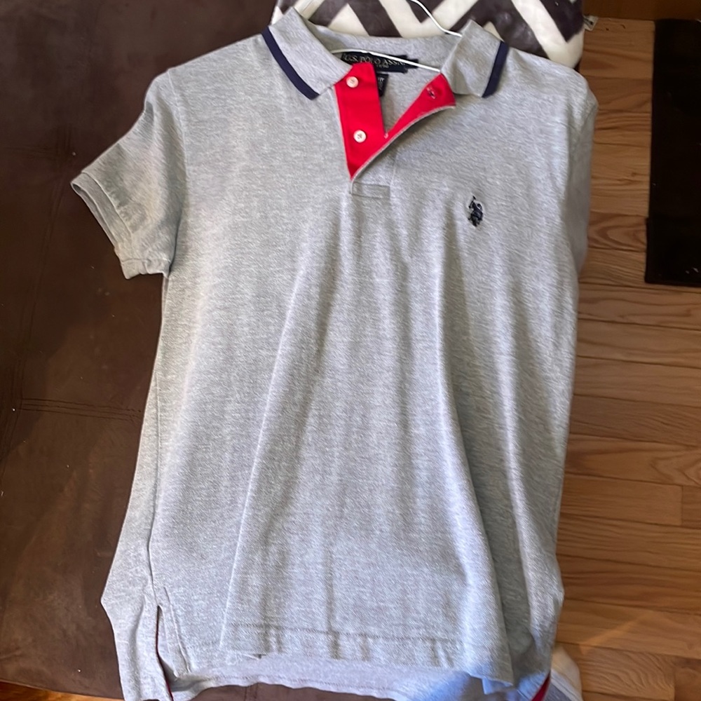 Grey us polo assn mens small polo with a navy blue logo and color outline